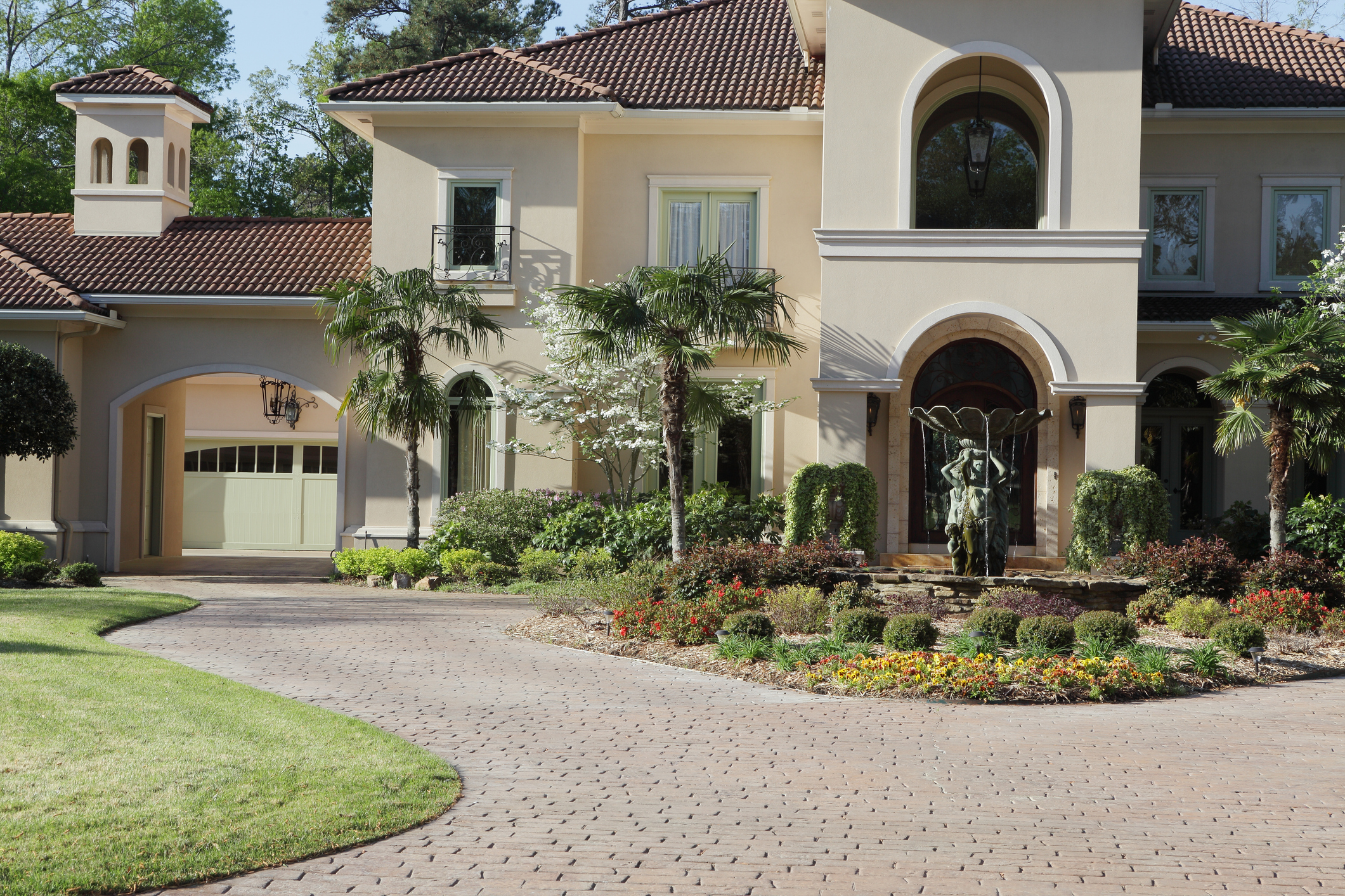 Luxury home exterior under early morning light.